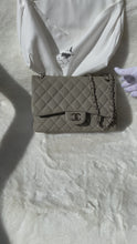 Load and play video in Gallery viewer, Chanel Classic Flap Jumbo Handbag
