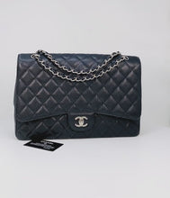 Load and play video in Gallery viewer, Chanel Classic Flap Maxi
